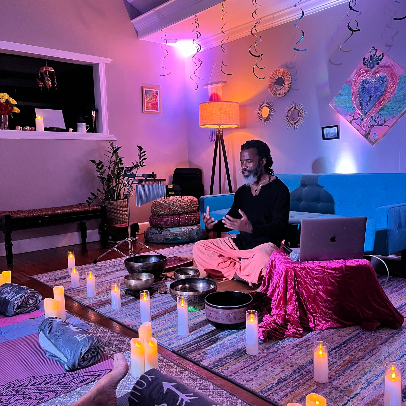 Moses Hill guiding a private in-home sound-healing experience
